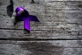 A purple ribbon for the awareness about the unacceptability of the violence against women, Royalty Free Stock Photo