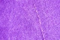 Purple rough stone texture closeup background Royalty Free Stock Photo