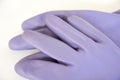 Purple rubber gloves Royalty Free Stock Photo