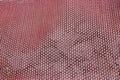 Purple rubber mesh laid on the ground for drying, Net shaped floor mat for floors Royalty Free Stock Photo