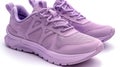 Purple running shoe on urban background. Close-up shot with selective focus Royalty Free Stock Photo