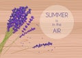 Purple rustic flowers with summer in the air words in a circle on wooden board.