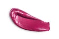 Purple shiny lip gloss stroke for makeup as sample of cosmetic product