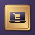 Purple Shopping cart on screen laptop icon isolated on purple background. Concept e-commerce, e-business, online