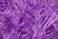 Purple shredded plastic fake Easter grass background