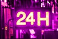 Purple Sign to show customer that is open 24 hours March 8 International Women`s Day