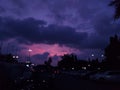 Purple skies feat cars lightning