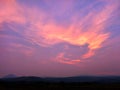 Purple sky during sunset over the field Royalty Free Stock Photo