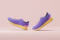 Purple sneakers moving on copy space pink background