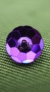 Purple soccer ball on green surface Royalty Free Stock Photo