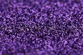 Purple Sparkle Glitter background. Holiday, Christmas, Valentines, Beauty and Nails abstract texture Royalty Free Stock Photo