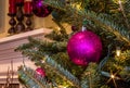 Purple Sparkling Ornament on Christmas Tree