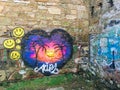 Love heart graffiti tagged on a wall