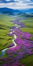 Mesmerizing Aerial View Of A Colorful Field With A Serene River