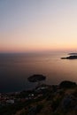 Purple summer sunset over the sea around the island of Sveti Stefan. Montenegro. Top view Royalty Free Stock Photo