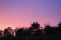 A serene pink and purple sunset as twilight settles across the sky Jenningsville Pennsylvania