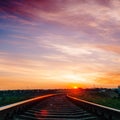 Purple sunset over railroad Royalty Free Stock Photo