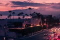 Purple sunset in Santa Monica with palms and traffic on freeway