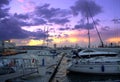 Purple sunset sky over yacht port