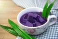 Purple sweet potato in sweet soup Royalty Free Stock Photo