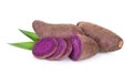 Purple sweet potato or yam with green leaf isolated on white Royalty Free Stock Photo