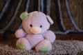 Purple teddy bear with cool bow tie Royalty Free Stock Photo