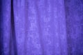 the purple textured curtain background close up