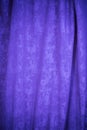 the purple textured curtain background close up