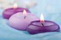 Purple toned candles on baby blue silk (2)