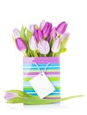 Purple tulip bouquet in gift bag Royalty Free Stock Photo