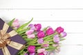 Purple tulips and gift box Royalty Free Stock Photo