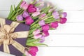 Purple tulips and gift box Royalty Free Stock Photo