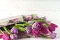 Purple tulips and gift box Royalty Free Stock Photo