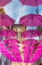 Purple umbrellas in front of the Notre Dame gate in Saint-Jean-Pied-de-Port