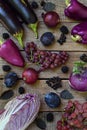 Purple vegetables and fruits. Plum, eggplant, pepper, blueberries, rowanberry. Violet organic foods high in antioxidants, anthocya Royalty Free Stock Photo