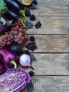 Purple vegetables and fruits. Plum, eggplant, pepper, blueberries, rowanberry. Violet organic foods high in antioxidants, anthocya Royalty Free Stock Photo