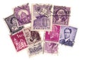 Purple vintage postage stamps from around the world.