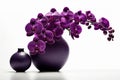 Purple, violet Phalaenopsis orchid in a beautiful vase on a table in white background.