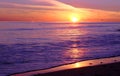 Purple waves an Orange sky`s at El Matador State beach Royalty Free Stock Photo