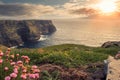 Spectacular scenery of Cliff of Moher, county Clare, Ireland. Warm sunny day. cloudy sky. Irish landscape Royalty Free Stock Photo