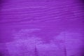 Purple wood texture. Purple wood background. Closeup view of purple wood texture and background. Vintage handmade table. Royalty Free Stock Photo