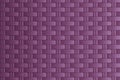 Purple woven carbon fibre textured Royalty Free Stock Photo