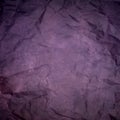 Purple wrinkled paper texture or background