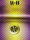 purple and yellow polka spots in a stainless steel sink