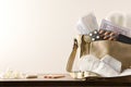 Purse with menstrual products on wooden table cloeup isolated background