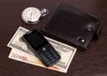 Purse money hours mobile phone Royalty Free Stock Photo