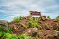 Pusawan signpost on the top of Pusawan mountain at Maewong National Park, Kamphaengphet province, Thailand: TEXT TRANSLATION: