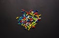 PusColorful push pins on black background. business concept Royalty Free Stock Photo
