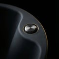 Blank black push button on dark background Royalty Free Stock Photo