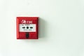 Push button switch fire alarm box on cement wall for warning and security system. Royalty Free Stock Photo